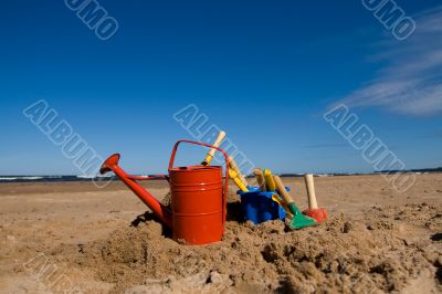 Beach toys in the sandy beach