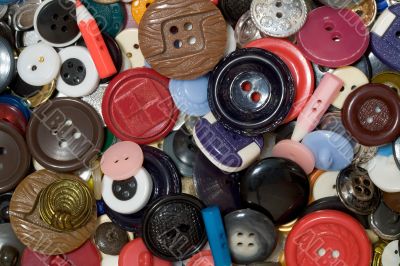 Multicolored plastic button background