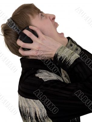 Person in ear-phones shouting
