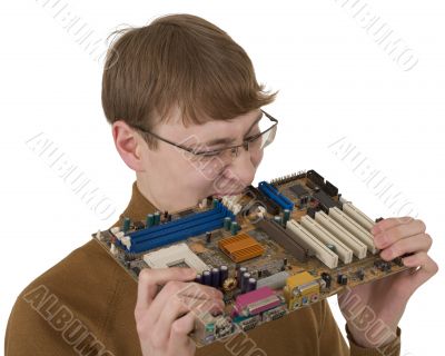 Young man bite motherboard