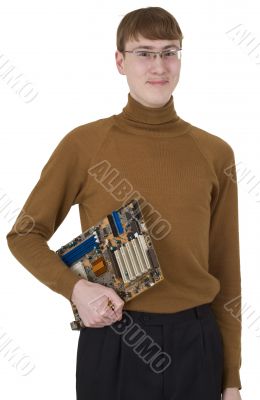 Young man holding motherboard