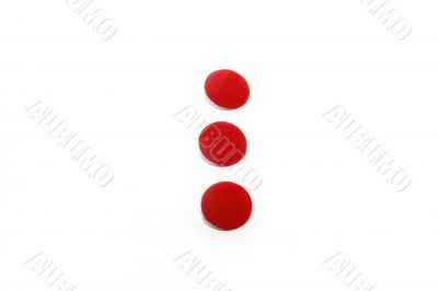 Three red round buttons