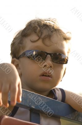 Boy in sun glasses
