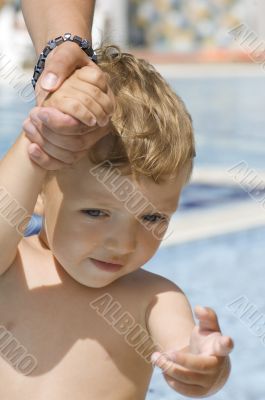 Boy in swimming-pool