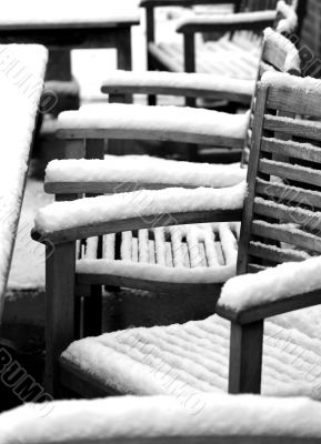 wooden furniture in snow