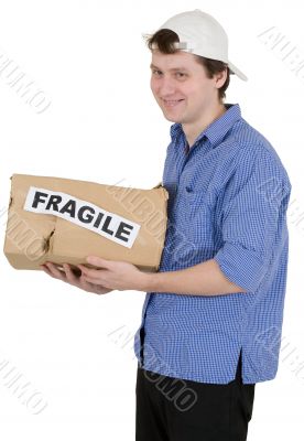 Man holded cardboard box with inscription `fragile`
