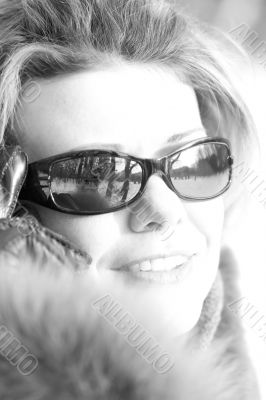 Woman in sun glasses closeup