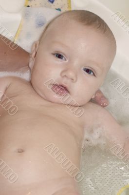 baby in bath closeup