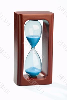 Mahogany sand timer isolated on white background