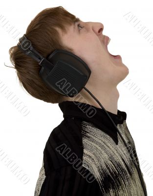 Young man yell with ear-phones