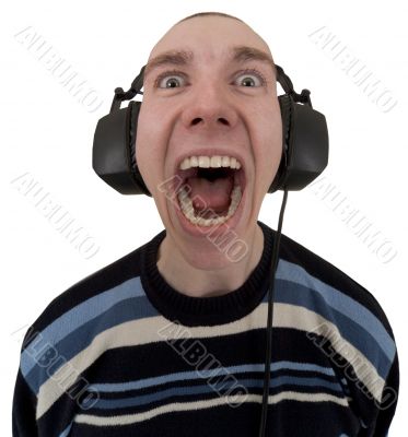 Man in ear-phones yelling songs