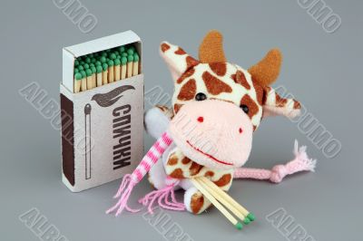 Cow with matches
