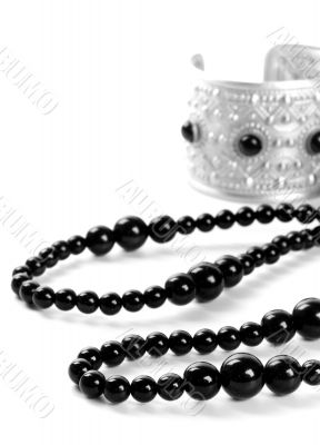 bracelet and black necklace