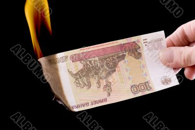 burning paper currency macro