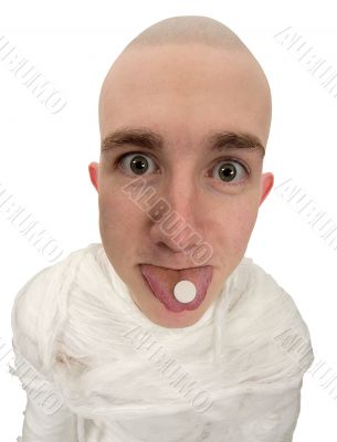 Patient with tablet on tongue