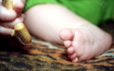 Infant foot and hand fingers with cracknel Infant foot and hand fingers with cracknel