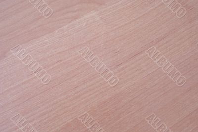 Light brown wooden background with diagonal veins