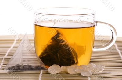 white tea, nylon tea-bag and sugar