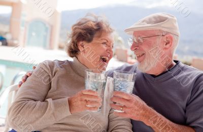 Happy Senior Adult Couple with Drinks