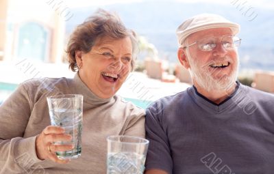 Happy Senior Adult Couple with Drinks