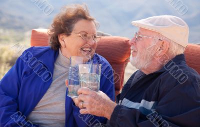 Happy Senior Adult Couple with Drinks