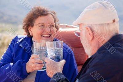 Happy Senior Adult Couple with Drinks