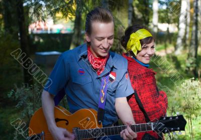 couple with a guitar