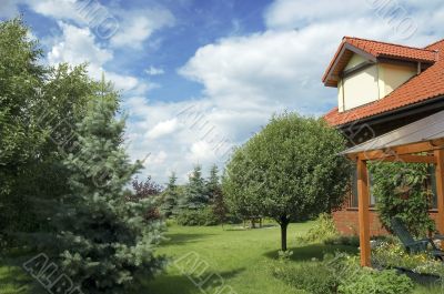 summer landscape. house and garden
