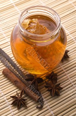fresh honey with honeycomb and spices