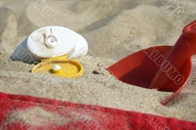 childhood. beach items and sun block