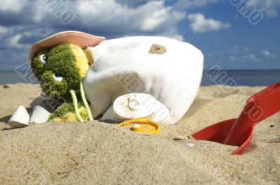 childhood. beach items and sun block