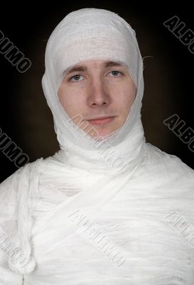 Portrain of sickly bandaget man