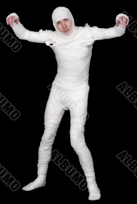 The mummy upright on a black background