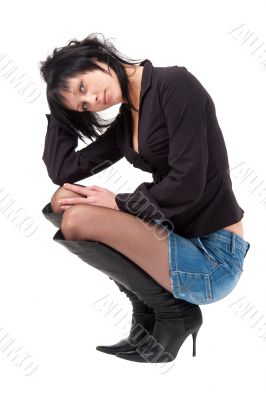 woman sitting on a white background