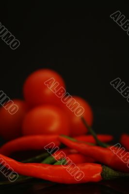 Red hot chilli pepper and tomato