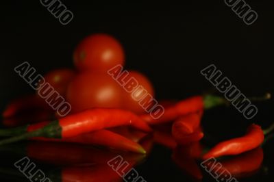 Red hot chilli pepper and tomato