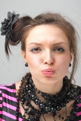 Kiss. Attractive young woman.