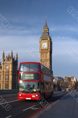 Houses of Parliament with red bus in London