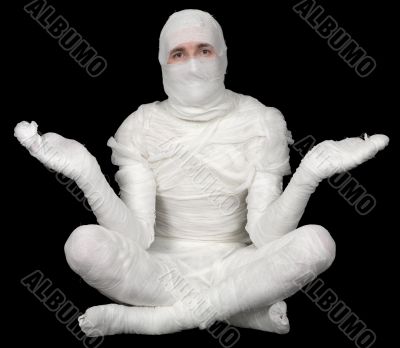 Man in bandaged sit on pose lotus