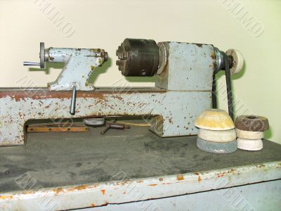 Ancient old rusty turning lathe machine tool
