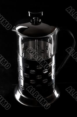 French-press in black background