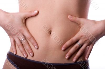 Woman measuring her waist