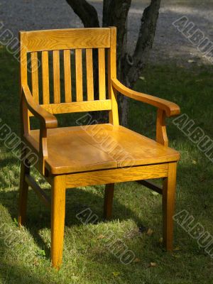 Old wood chair on grass