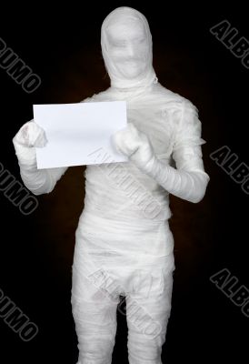 Mummy with sheet of paper