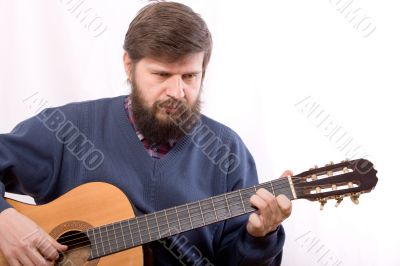 playing on guitar