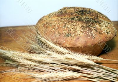 Loaf of bread and wheatears Loaf of bread and wheatears