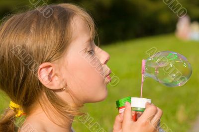 girl and a soap bubble
