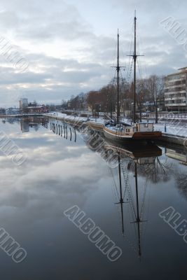 Sailing Boat and Reflection in Water.