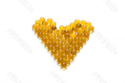 Disposit of the capsules cod-liver oil insulated on white backgr