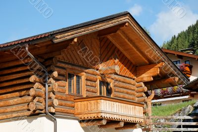 Wooden Alpine chalet with a balcony